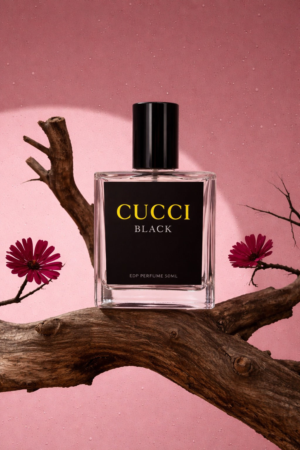 Cucci Black perfume bottle on a branch with pink flowers and background