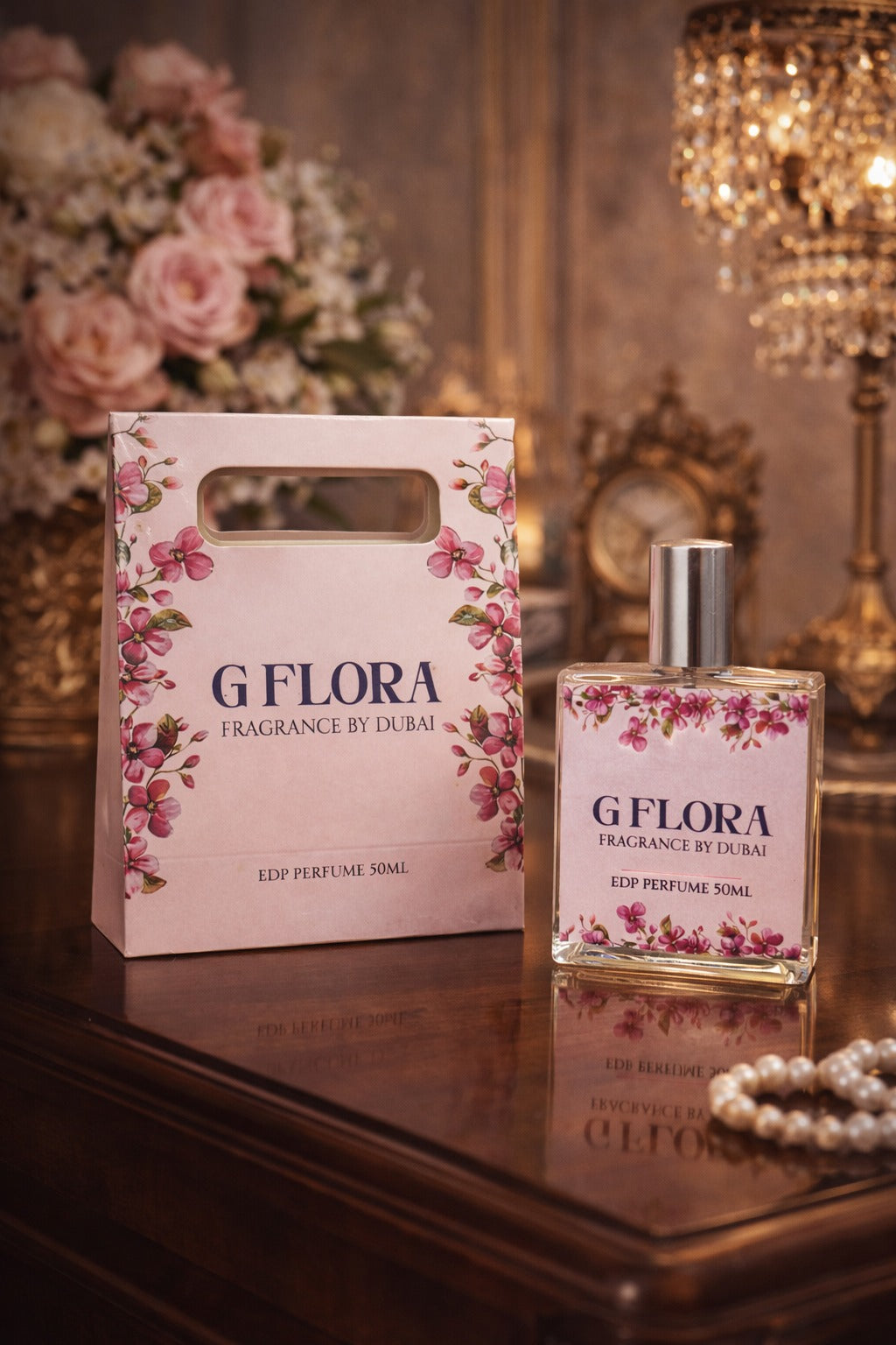 G'Flora perfume bottle and packaging on a reflective surface with decorative background