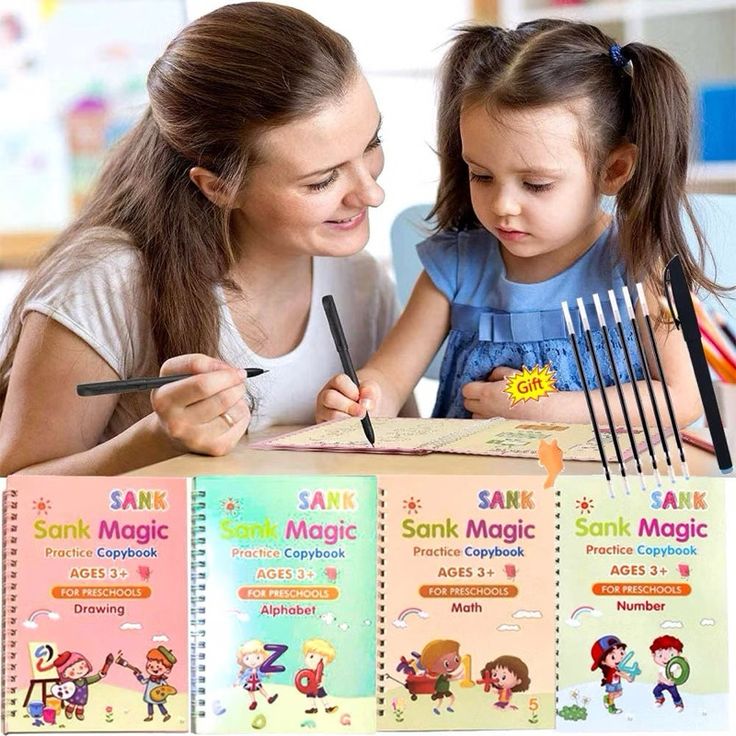 Woman and child engaged in an activity with coloring books and markers.